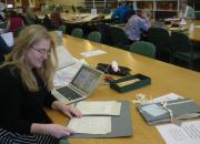 Researcher consulting the papers Henry Addington, 1st Viscount Sidmouth.  Courtesy of the South West Heritage Trust.