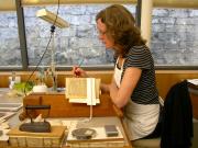 Jane Eagan conserving MS 154. Image courtesy of St John's College and the Oxford Conservation Consortium. Jane Eagan conserving MS 154. Image courtesy of St John's College and the Oxford Conservation Consortium.