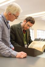 Robert Minte (left) Senior Conservator who treated the manuscript.