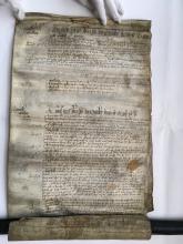 The unrolled court roll of 1565-1566.