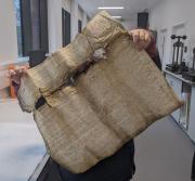 Parchment suffering water damage and loss caused by rodents