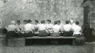 Waulking the tweed, in front of Stein School Building, Waternish